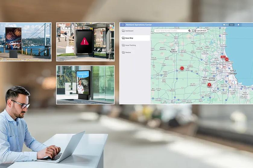 ProActive360 managed service with man at laptop managing digital signage for retail