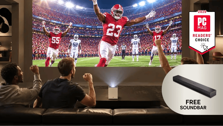 LG CineBeam S projector displaying football in living room setting with a Free Soundbar badge and a 2026 PC Mag Readers' Choice badge