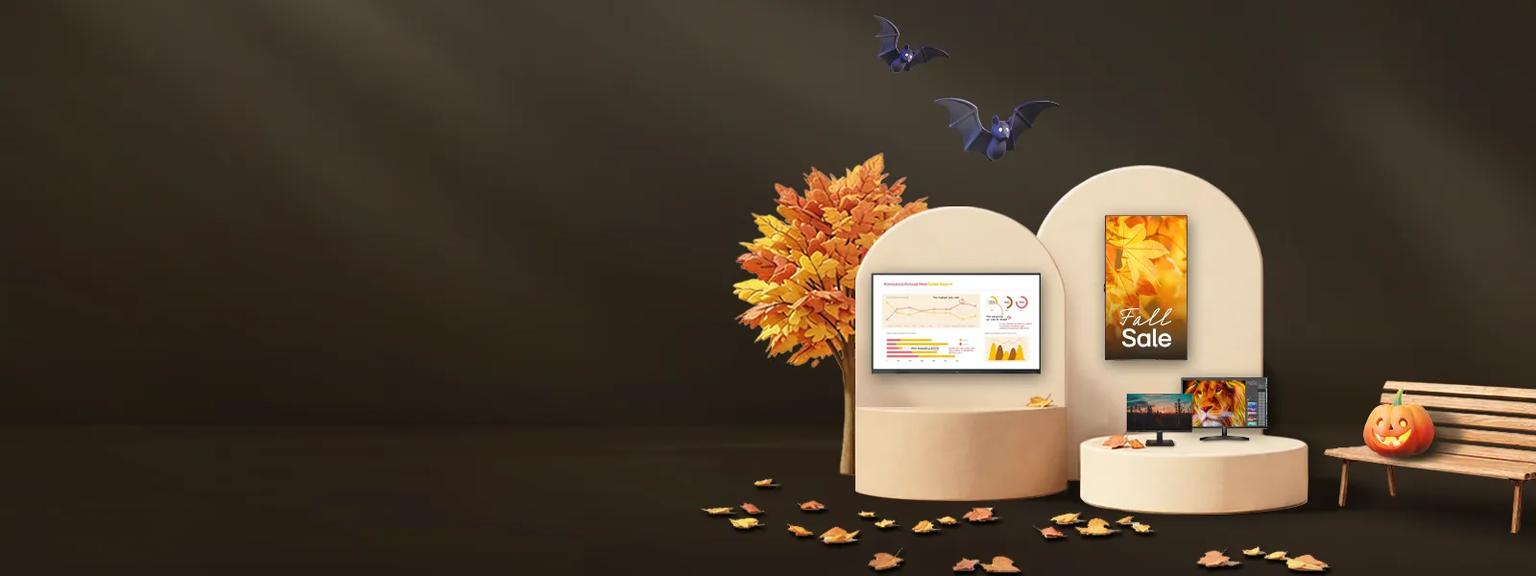 LG signage and monitors on a Halloween background
