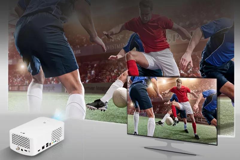 Contrast Ratio - projector comparison showing soccer game projected on a wall next a TV