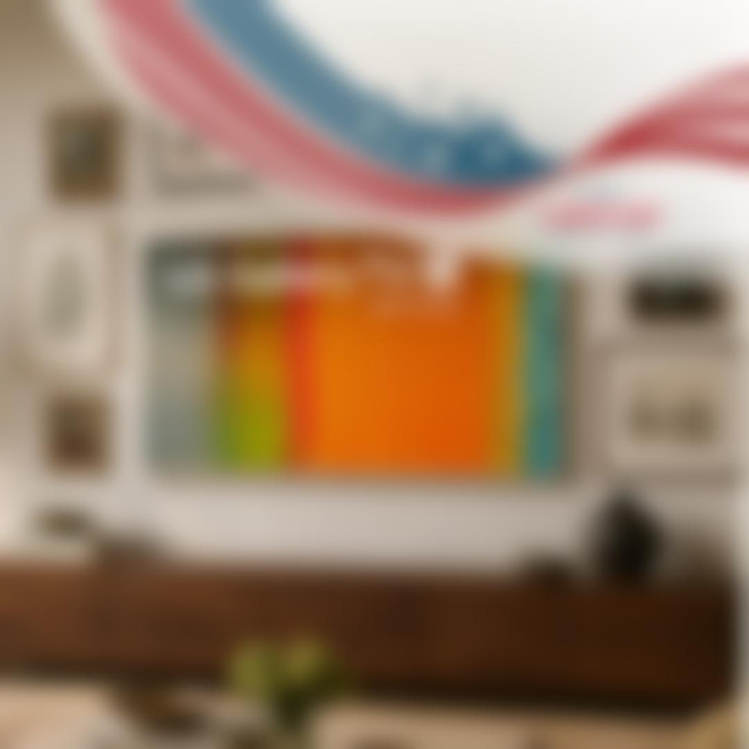 LG Gallery TV AI with frame mounted in a living room displaying colorful artwork, with Labor Day Savings Event badge featuring red, white, and blue stars and stripes graphic.