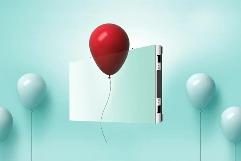 A DVLED panel with a red balloon attached, surrounded by light blue balloons.