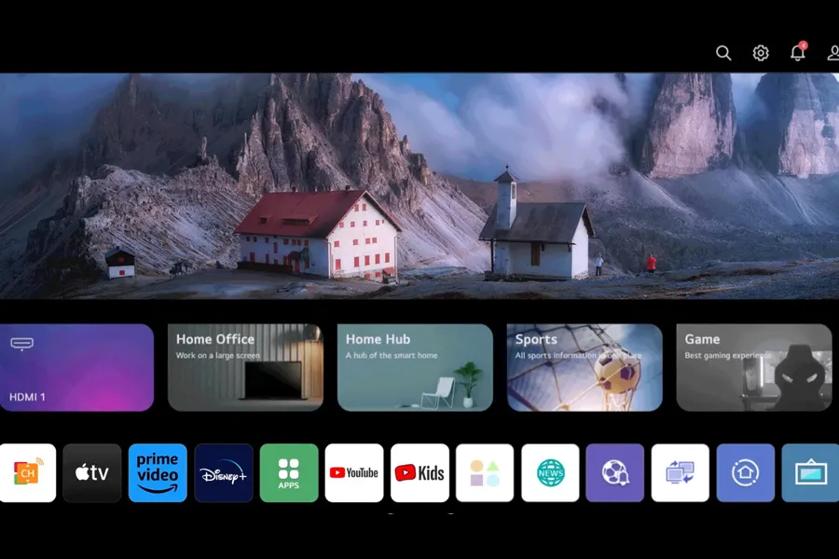 Smart TV home screen with mountain landscape, buildings, and various app icons.