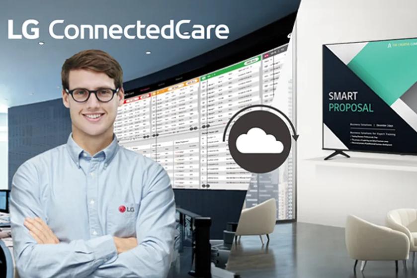 A man in an office in front of digital displays, with a cloud icon symbolizing connectivity.