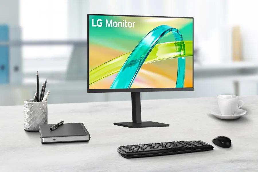 LG Monitor with thin bezels and adjustable stand on modern desk with keyboard and mouse
