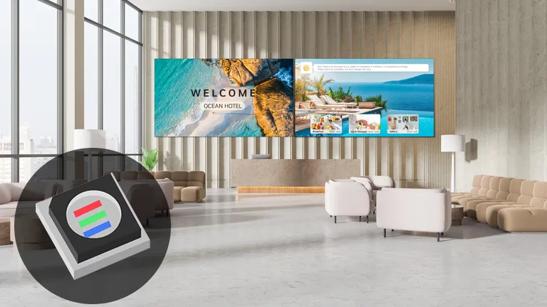 An interior view of a luxury hotel, with LG DVLED on the far wall. In the bottom left corner is an illustration of a Surface Mount Diode type DVLED pixel. 