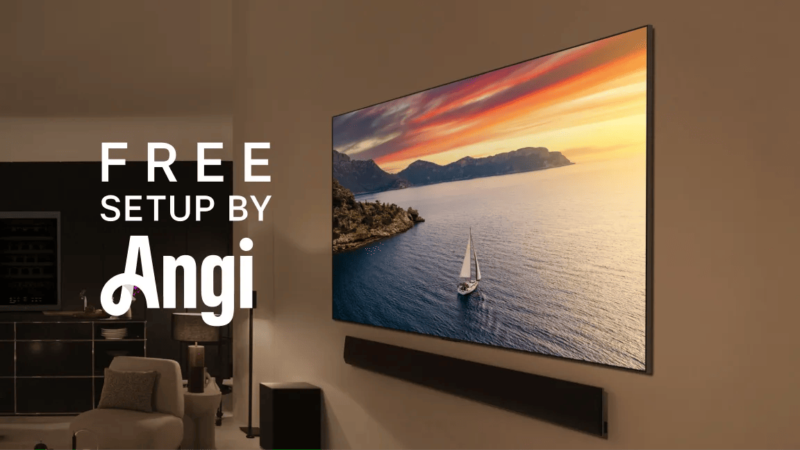 An LG TV and soundbar mounted on a living room wall as the TV displays a vivid nature scene. “Free setup by Angi” text.