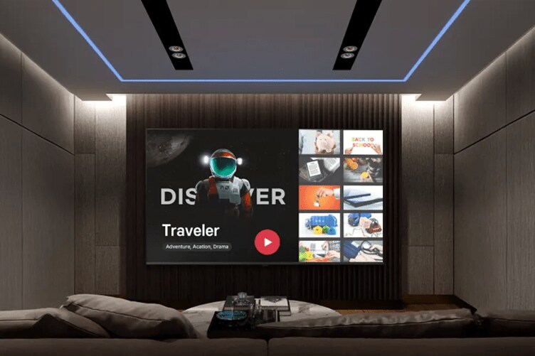 Home theater room with a large TV screen displaying an astronaut and the word "DISCOVER" along with other images.

Transcribed Text:

DISCOVER
Traveler
Adventure, Action, Drama
BACK TO SCHOOL