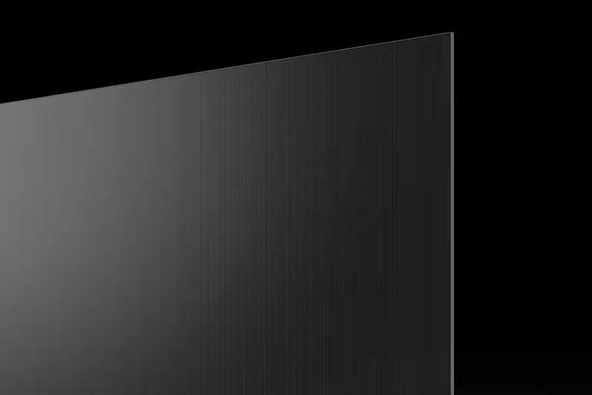 Black panel with a shiny surface and vertical lines against a black background.