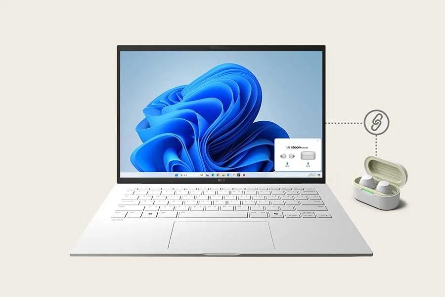 Image of the LG gram laptop and earbuds showing instant connection