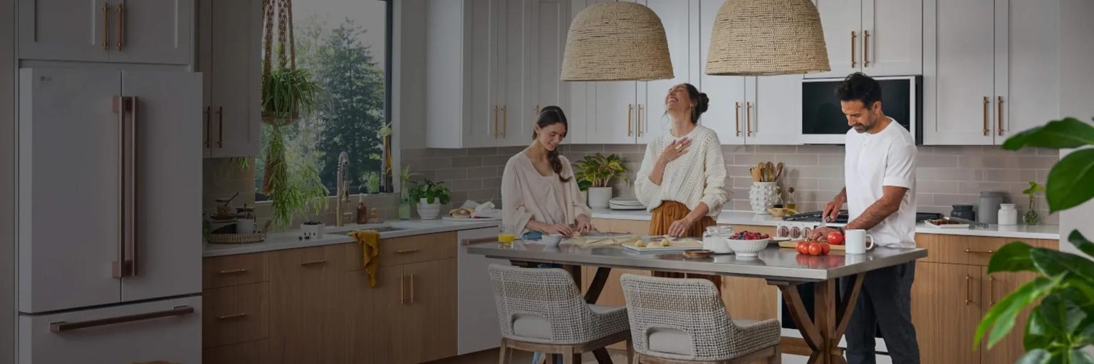 family in LG Kitchen preparing a meal