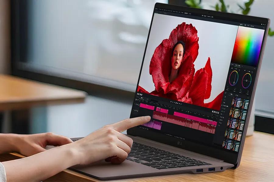 LG Gram 17Z90UB-H.AU75U3 laptop with touchscreen interface showing photo editing software with color controls and timeline