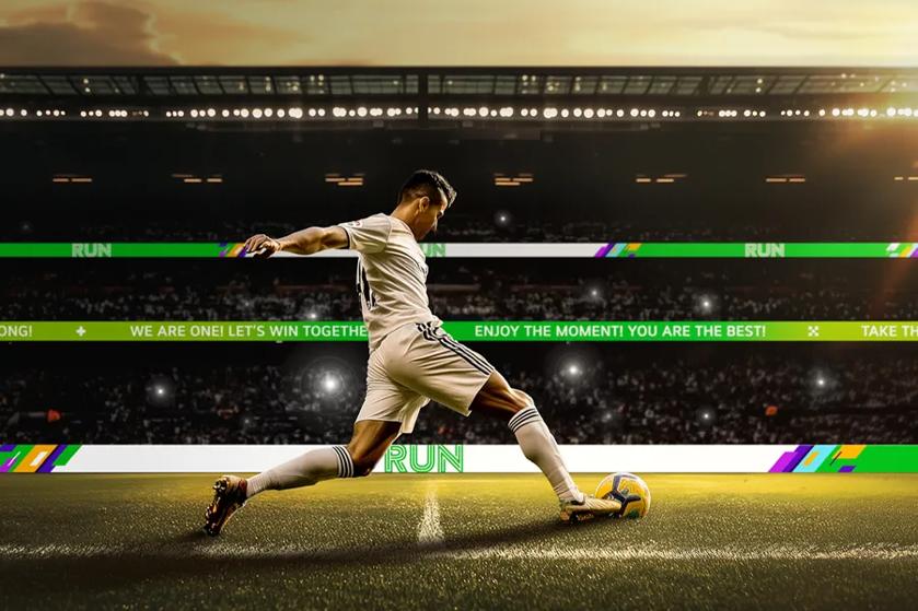 A soccer player in white uniform preparing to kick a ball in a stadium.