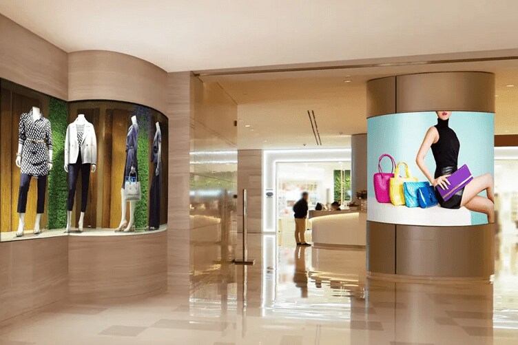 A retail space with large fashion ads displayed on LG LSCB DVLED displays.