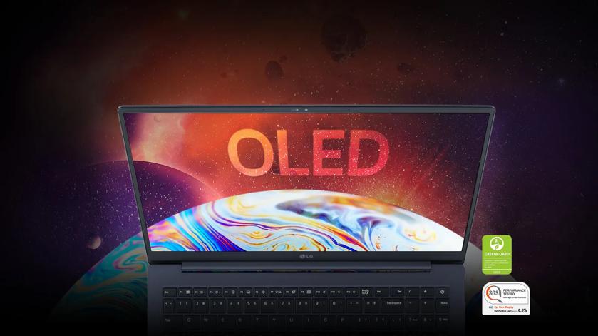 An OLED LG gram laptop displayed against a vibrant galaxy background, showcasing its sleek design and vivid colors.
