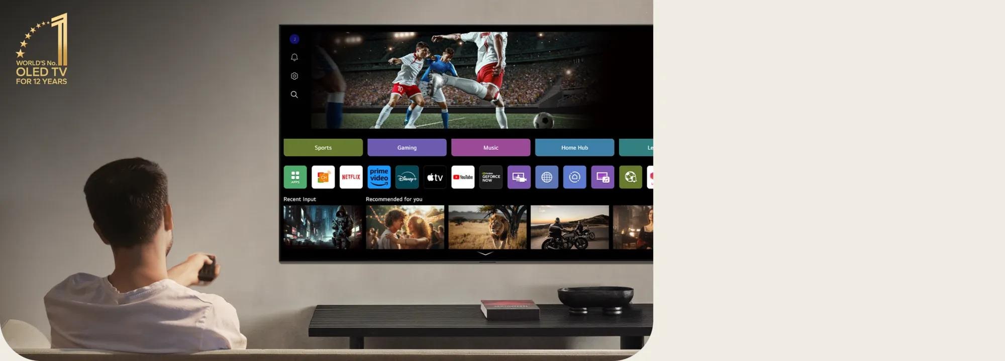 A man browses the webOS interface on an LG OLED evo using his Magic Remote. A gold icon reads 'World's No. 1 OLED TV for 12 Years' in the top left corner.