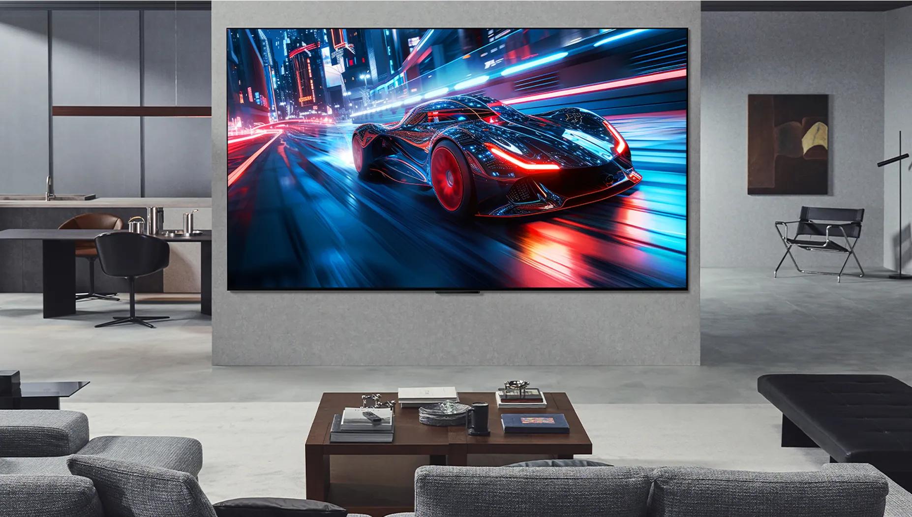 Modern living space with large wall-mounted LG TV showing sleek sports car racing through city streets in bright, vivid colors.