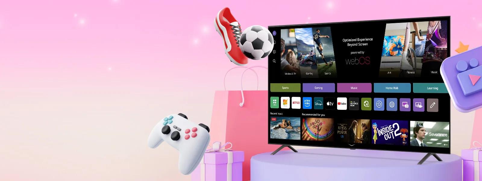 LG TV on a stand and on a pink background showing the webOS interface, with cgi versions of a soccer cleat, a soccer ball and a game controller in the frame.