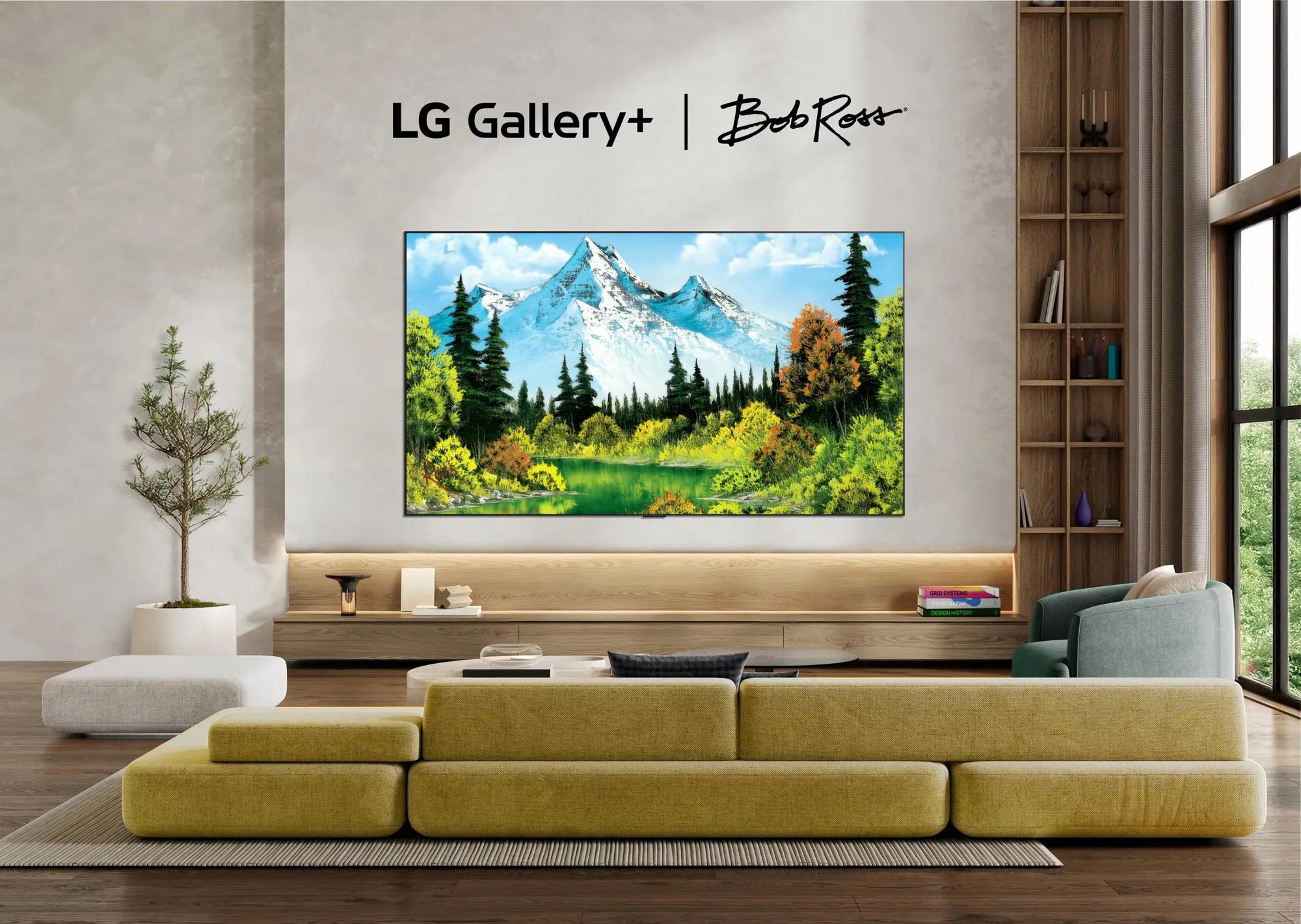 LG TV wall-mounted in a living room displaying a Bob Ross landscape painting, with LG Gallery+ | Bob Ross logo above