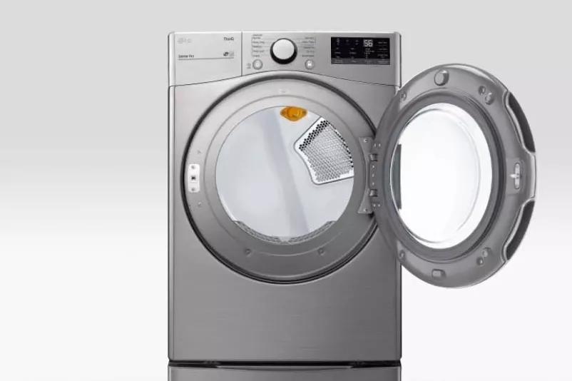 Washer showcasing reversible door