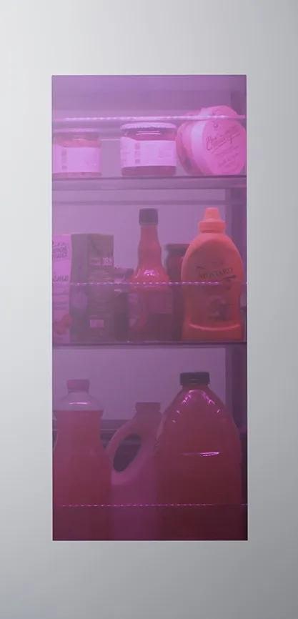 Interactive feature showing an InstaView panel on the left and a color-selection interface on the right. Users can choose from five LED lighting options: Emerald Green, Sapphire Blue, Amethyst Purple, Ruby Red, or Citrine Orange. When a color is selected, the name of that hue appears and the InstaView window reveals the inside of the fridge illuminated in that chosen color.