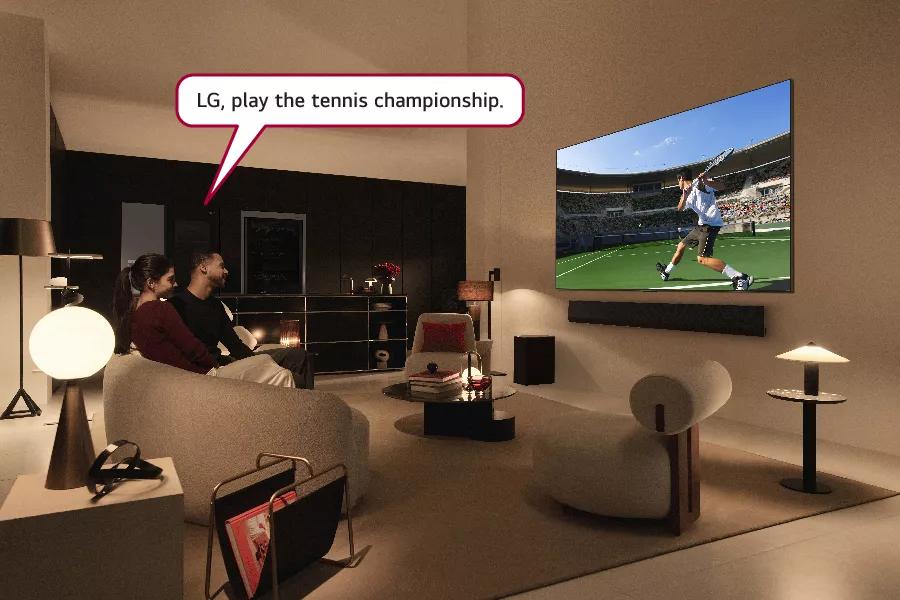 Couple watching sports on LG OLED TV 