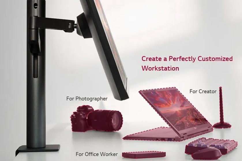 The image features a side view of a computer monitor mounted on a vertical stand, highlighting an ergonomic setup. The background is simple, emphasizing the monitor positioned prominently. On the surface below the monitor are icons representing different types of work: a camera (for a photographer), a laptop displaying a scenic image (for a creator), and a keyboard with an accessory (for an office worker). The overall color scheme is neutral, with the objects in shades of dark red, providing a contrast against the light background. The arrangement conveys a message of customized workstation setups for various professional needs.