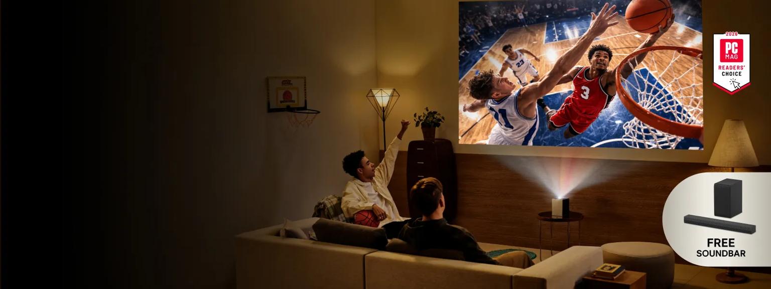 A group of friends watch a basketball screen with an LG projector from a living room. “Free Soundbar” pop-out text. “2026 PC MAG Readers’ Choice” badge.