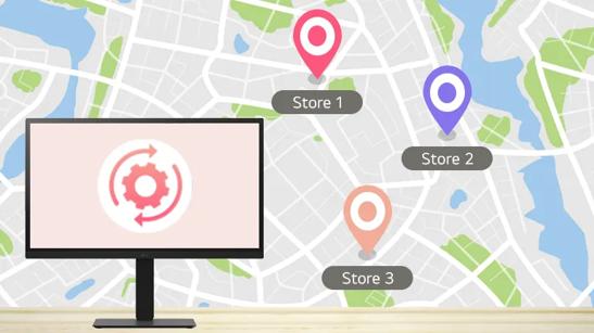 An LG Monitor sits on a desk. Behind it, a minimalist map of a city is displayed. Three map marker icons show the locations of stores, indicating the remote control capabilities of LG Business Cloud software.