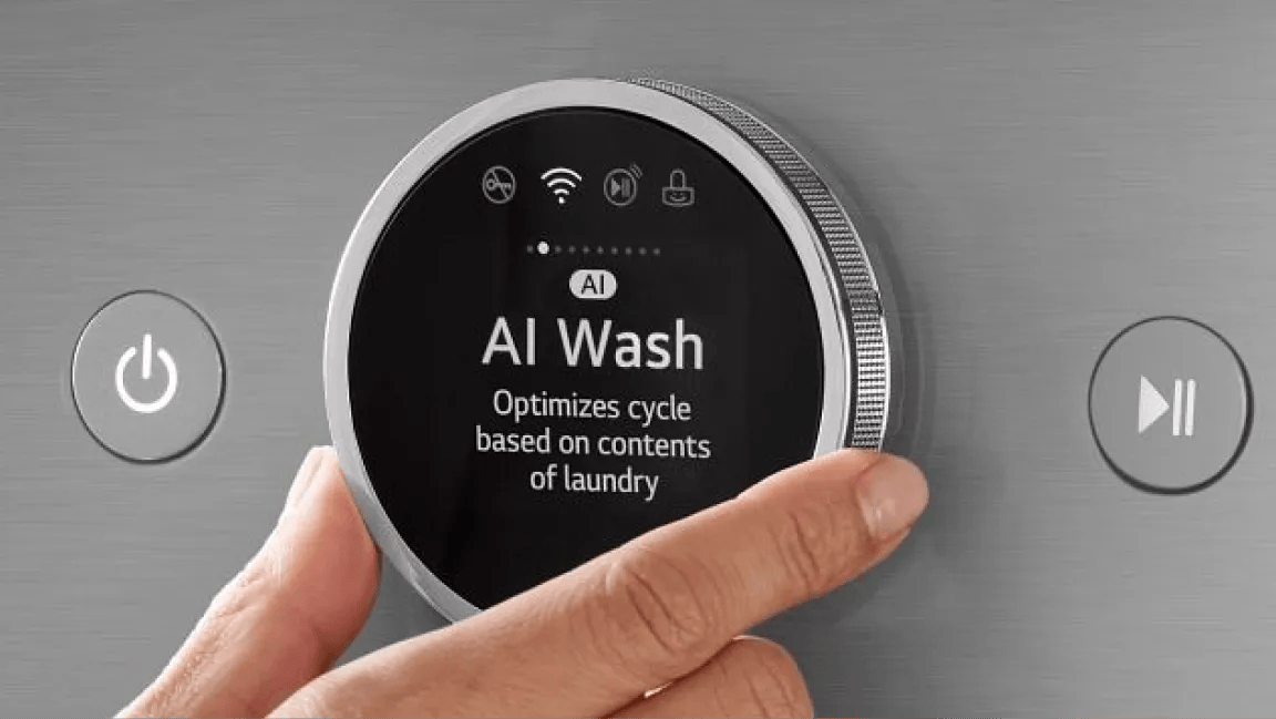 Closeup of a hand adjusting appliance dial to “AI Wash”.