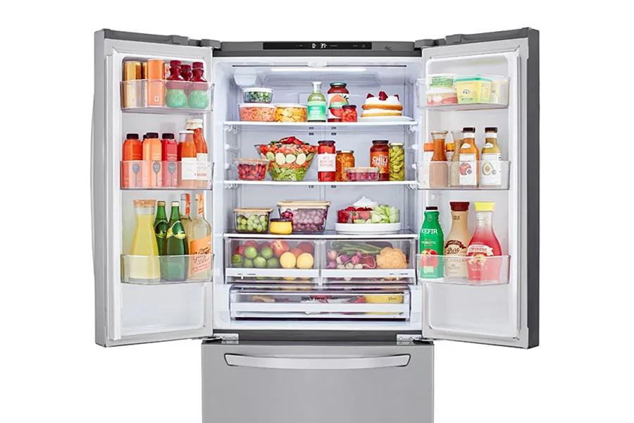 French door refrigerator open filled with food