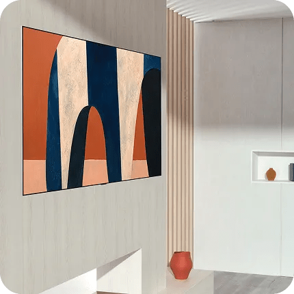A minimalist interior with light wood paneling features the LG OLED evo G6 Gallery TV mounted flush to the wall, displaying a bold abstract artwork in warm orange and deep blue tones. Vertical architectural lines, a recessed niche and a sculptural floor vase surround the TV.