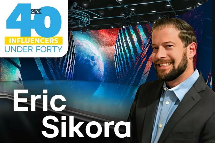 LG B2B Salesman Eric Sikora smiles at the camera. Behind him is a DVLED installation featuring bold abstract imagery. Commercial Integrator's 40 Influencers Under 40 logo is in the top left of the image, and his name is at the bottom left in white text. 
