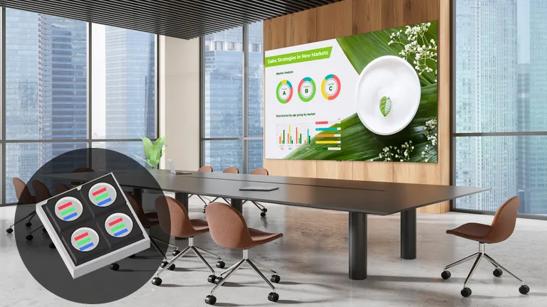A modern office space with an LG DVLED display on the wall. In the bottom left corner is an illustration of a Integrated Matrix Device type DVLED pixel. 