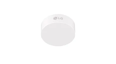 LG branded small round white temperature sensor device on white background