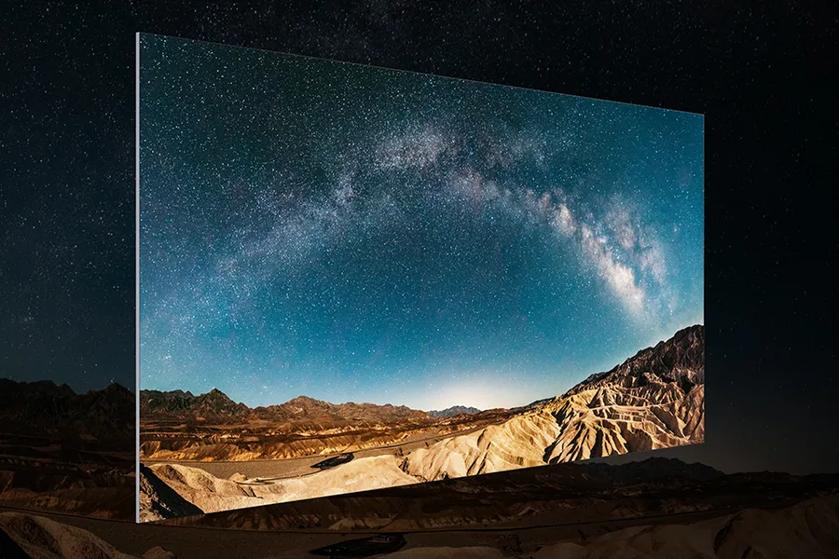 Digital Display of a desert landscape under a starry sky with the Milky Way visible.