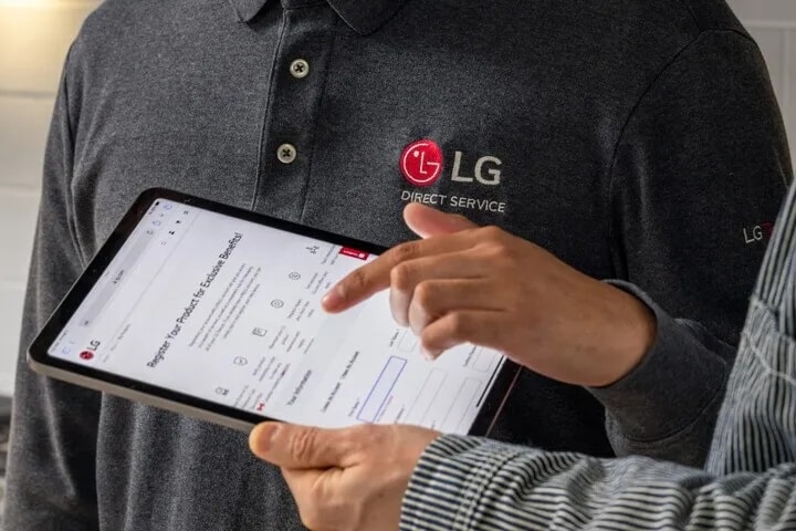 customer service representative holding mobile tablet