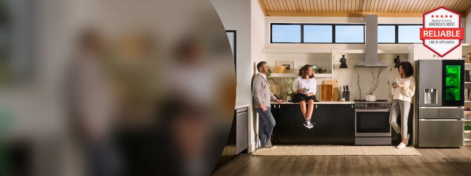People standing in a luxury kitchen  with LG Appliances