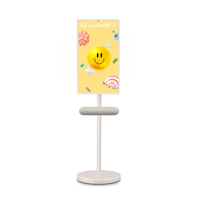 27LX6TYGA LG StanbyME 2 portable touchscreen display on adjustable stand with yellow screen showing smiley face and decorative graphics
