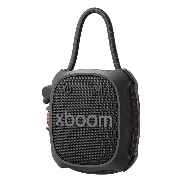 LG xboom ROCK_CNOALBK portable speaker with black mesh grille, fabric carrying handle with red accents, and control buttons on side