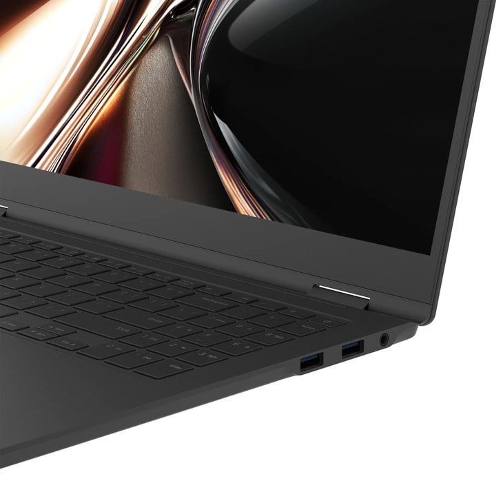 LG Gram 16T95TP-K-AD87U1 Laptop showing keyboard, USB ports, and display with abstract colorful background - Side Angle