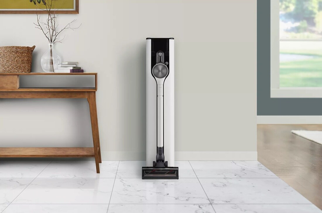lg a931kwm cordzero vacuum with led light front view connected to charger 