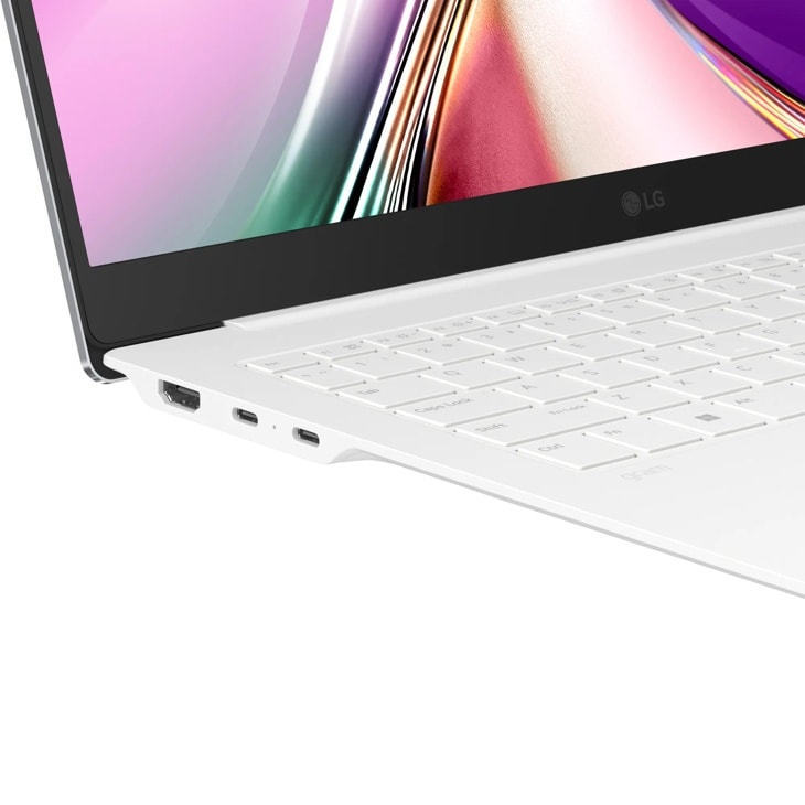 LG Gram 16Z95U-G.AU82U1 Laptop showing USB-C ports and white keyboard with colorful display screen - Right side view