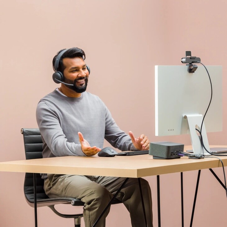 981001435 computing accessories setup with headset microphone and webcam mounted on monitor for video conferencing - Lifestyle