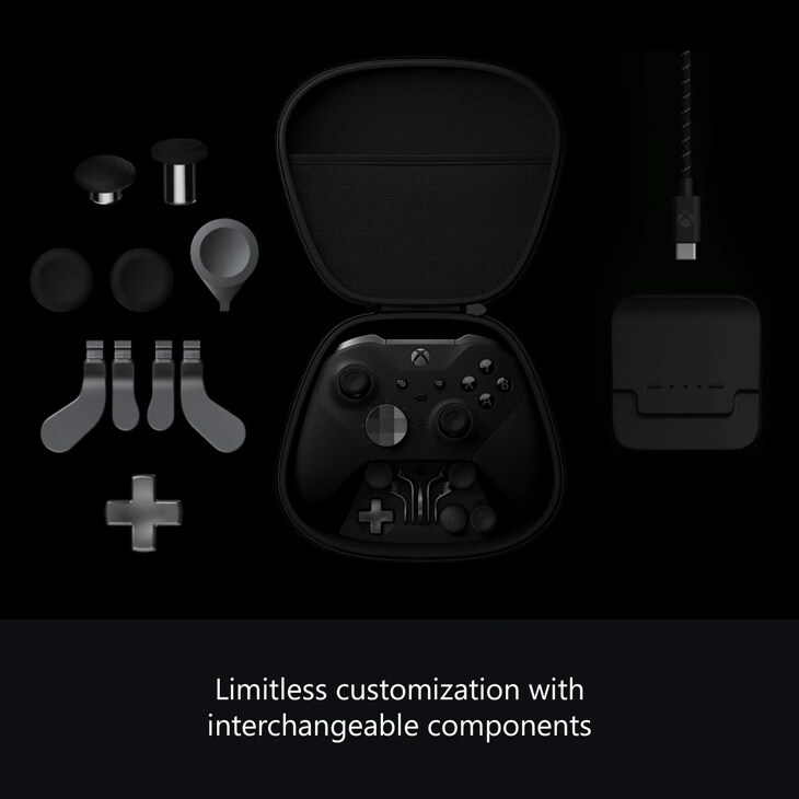 Xbox Elite Controller FST00001 with carrying case, interchangeable thumbsticks, paddles, D-pad components, charging dock and cable