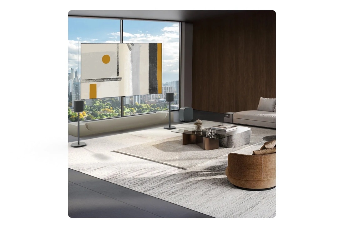 LG M5-P2_W7 Soundbar with wireless rear speakers in modern living room with city view
