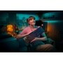 Logitech 920012696 gaming keyboard with RGB backlit keys displayed in atmospheric gaming setup with teal lighting - Lifestyle View