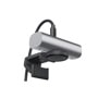 Logitech 960001529 webcam with cylindrical silver body, adjustable black mount, and integrated cable - Side Angle