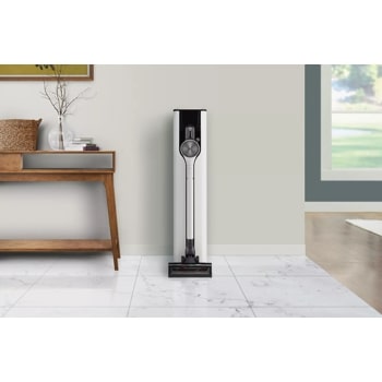 lg a931kwm cordzero vacuum with led light front view connected to charger 