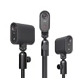 Logitech 961000500 webcams with adjustable mounting stands showing three different camera positions with status indicator lights